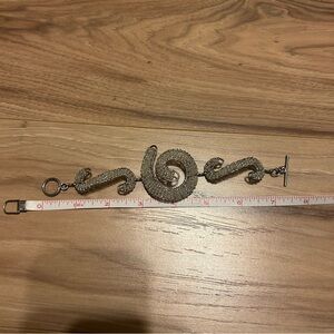 Elegant Silver Swirl Bracelet